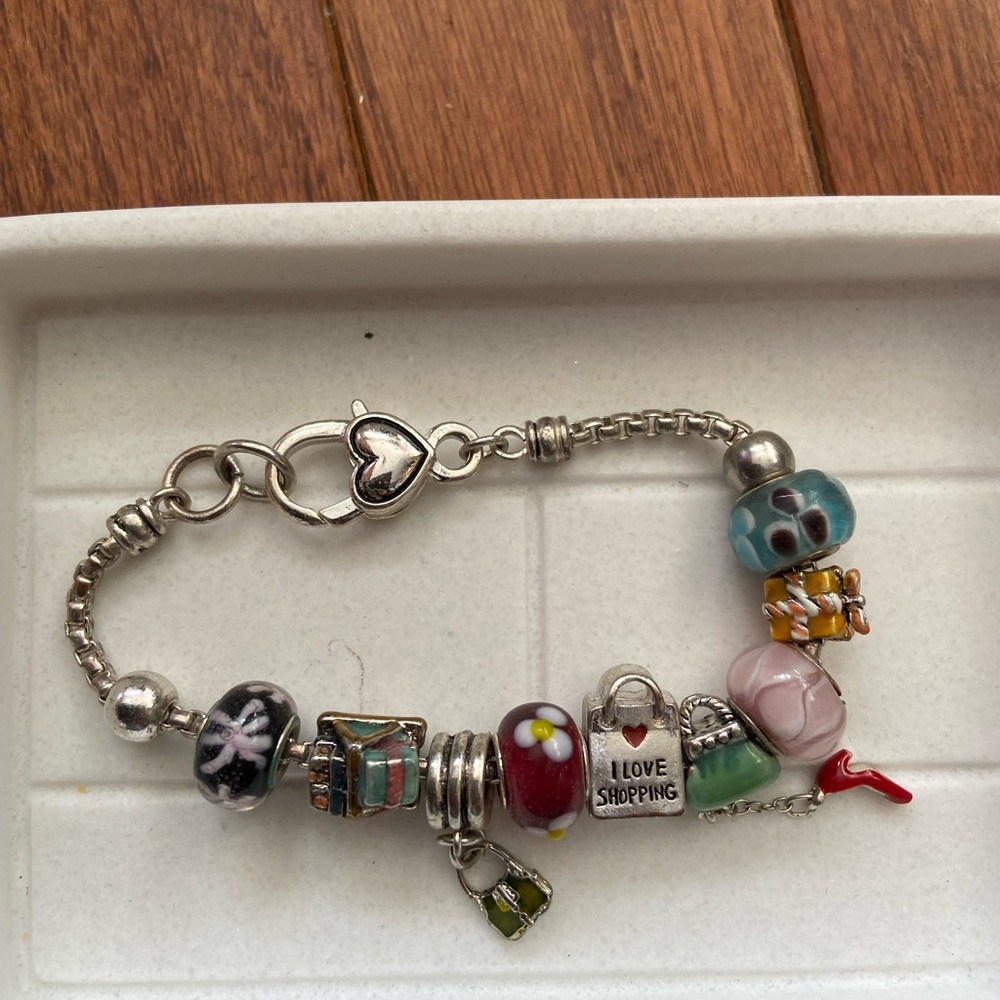 Shopping Charm Bracelet. Metal and Glass Beads and Charms. Claw Closure.